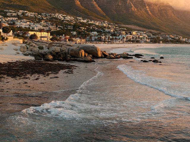 Sunset over Camps Bay with the Twelve Apostles mountains