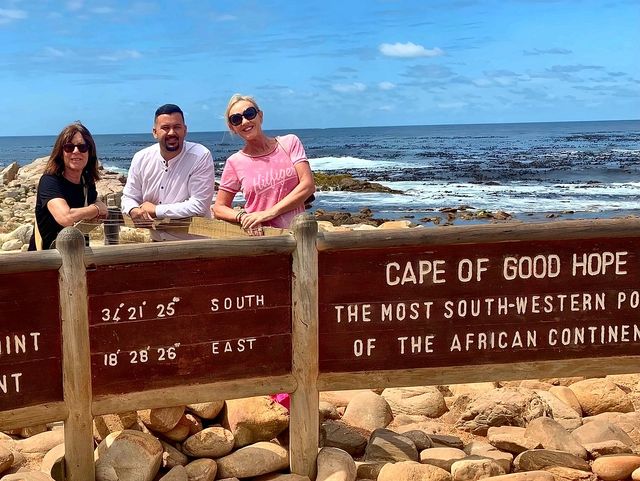 Guests at the Cape of Good Hope sign
