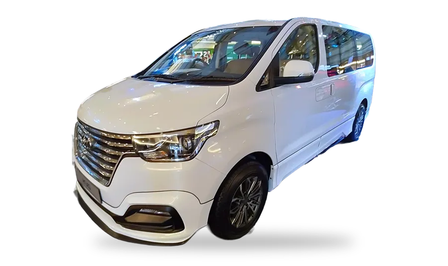 White Hyundai H1 minivan